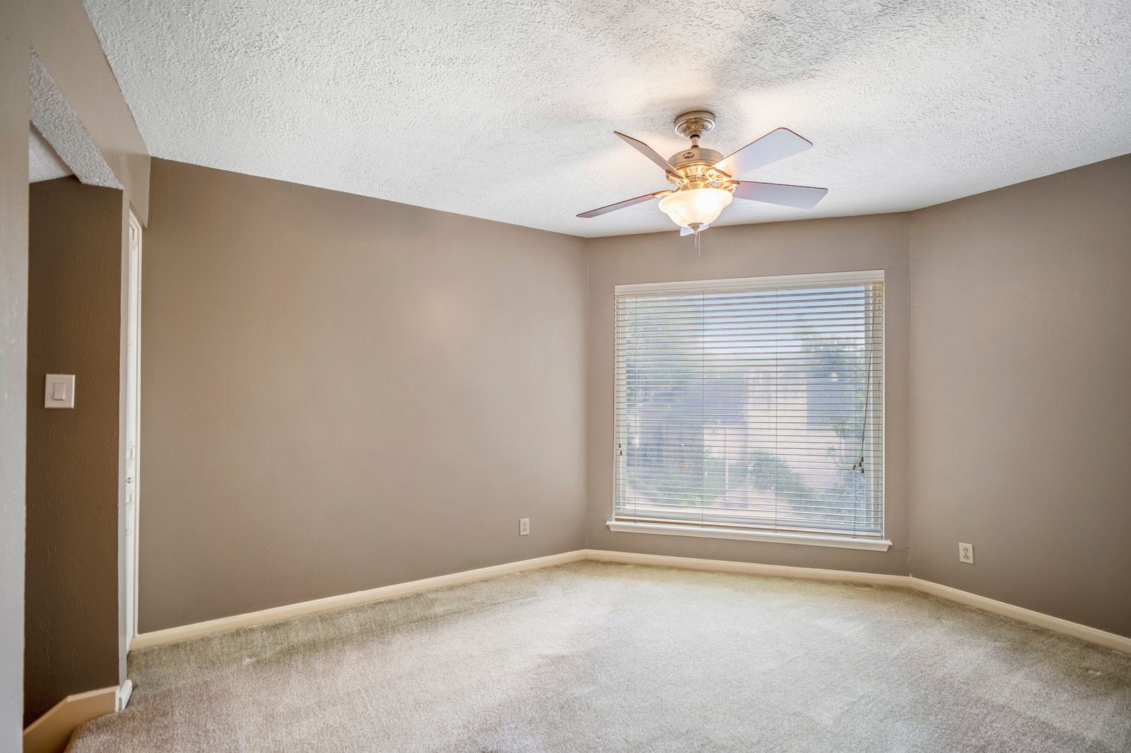 1306 Riverview Court Houston, TX 77077 - Photo 36 of 44 a view of an empty room with a window