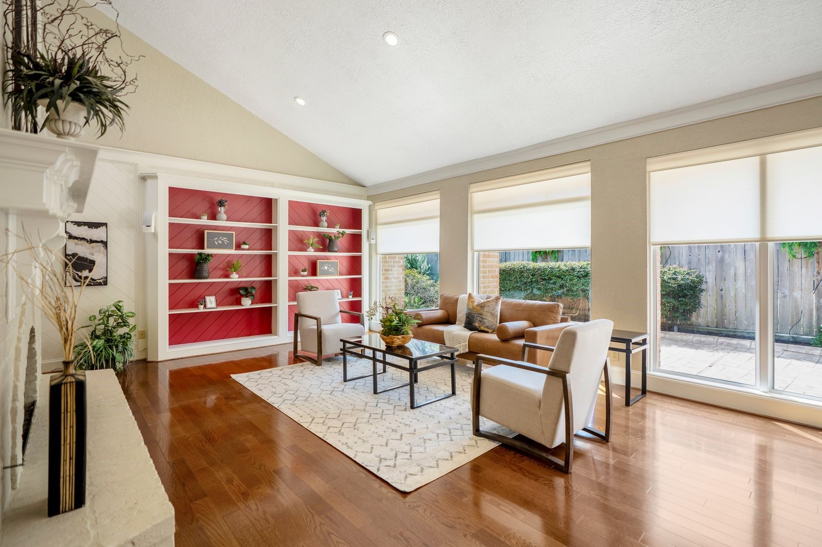 1306 Riverview Court Houston, TX 77077 - Photo 4 of 44 a living room with furniture and a floor to ceiling window