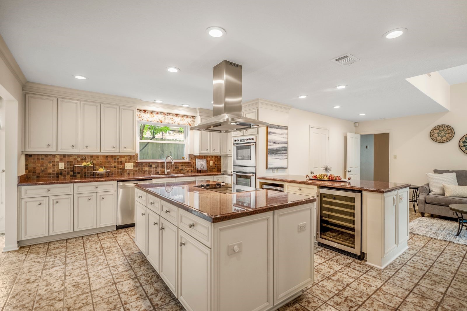 1306 Riverview Court Houston, TX 77077 - Photo 5 of 44 a kitchen with stainless steel appliances granite countertop a sink and stove