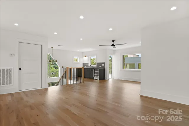 a view of a kitchen with a sink and a window
