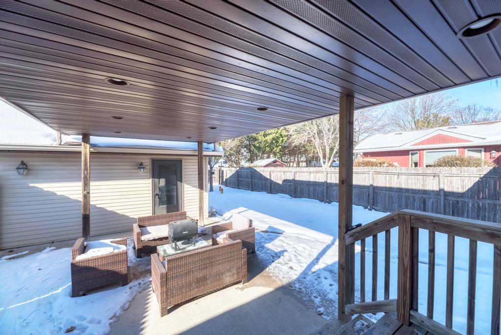 2402 Chestnut Lane Morris, IL 60450 - Photo 26 of 30 a view of a patio with couches chairs and wooden floor