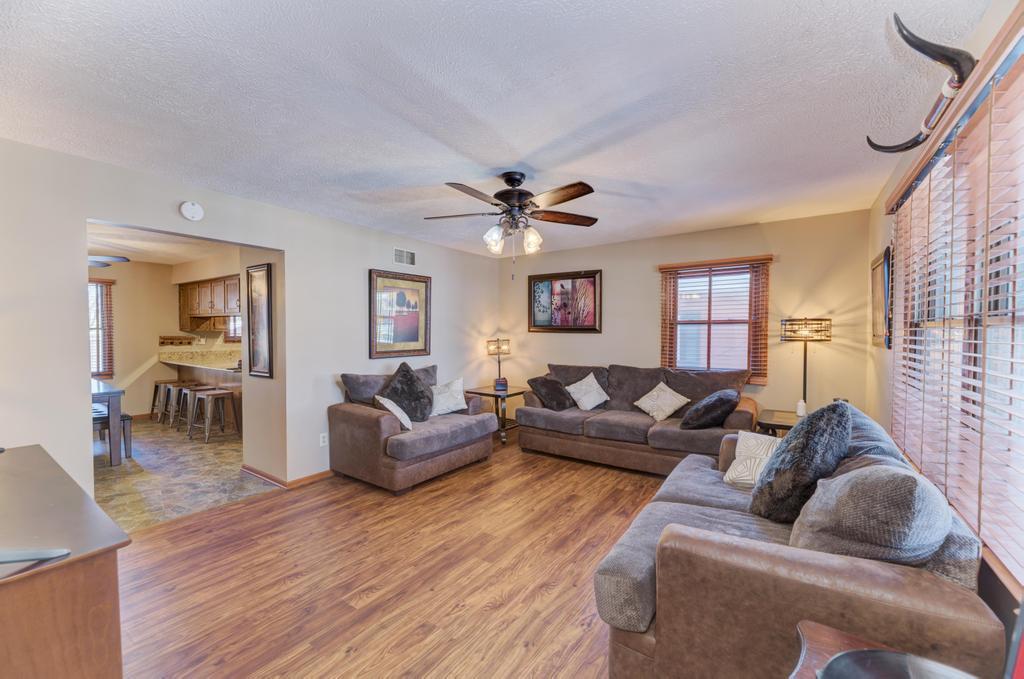 2402 Chestnut Lane Morris, IL 60450 - Photo 4 of 30 a living room with furniture and wooden floor
