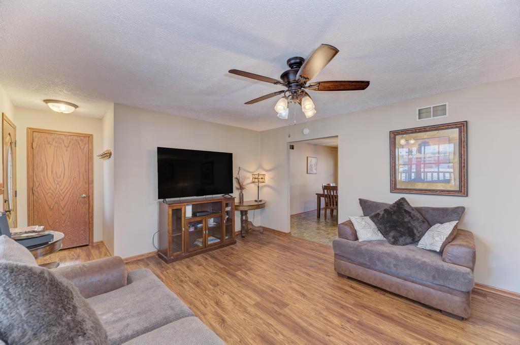 2402 Chestnut Lane Morris, IL 60450 - Photo 6 of 30 a living room with furniture and a flat screen tv