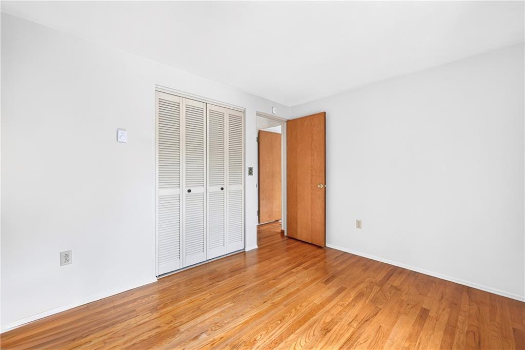 224 Bowman Road Bridgeville, PA 15017 - Photo 22 of 50 The primary bedroom overlooks the back yard. So much greenery and privacy! And with a half ensuite bathroom, you wont have to share the main bath with your guests. There is even room to add a shower!
