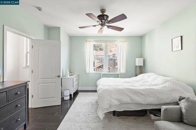 a bedroom with a bed and window