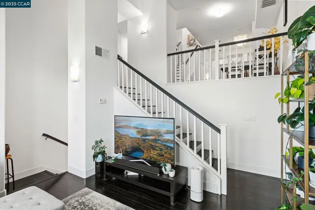 a view of entryway with wooden floor