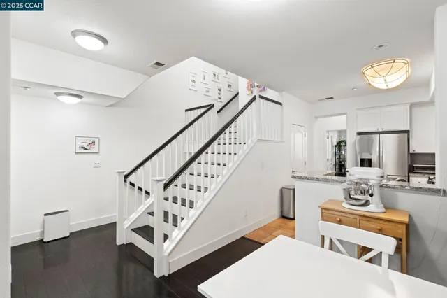 a view of a livingroom with furniture and a table