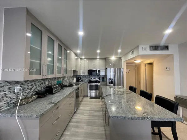 a large kitchen with lots of counter space