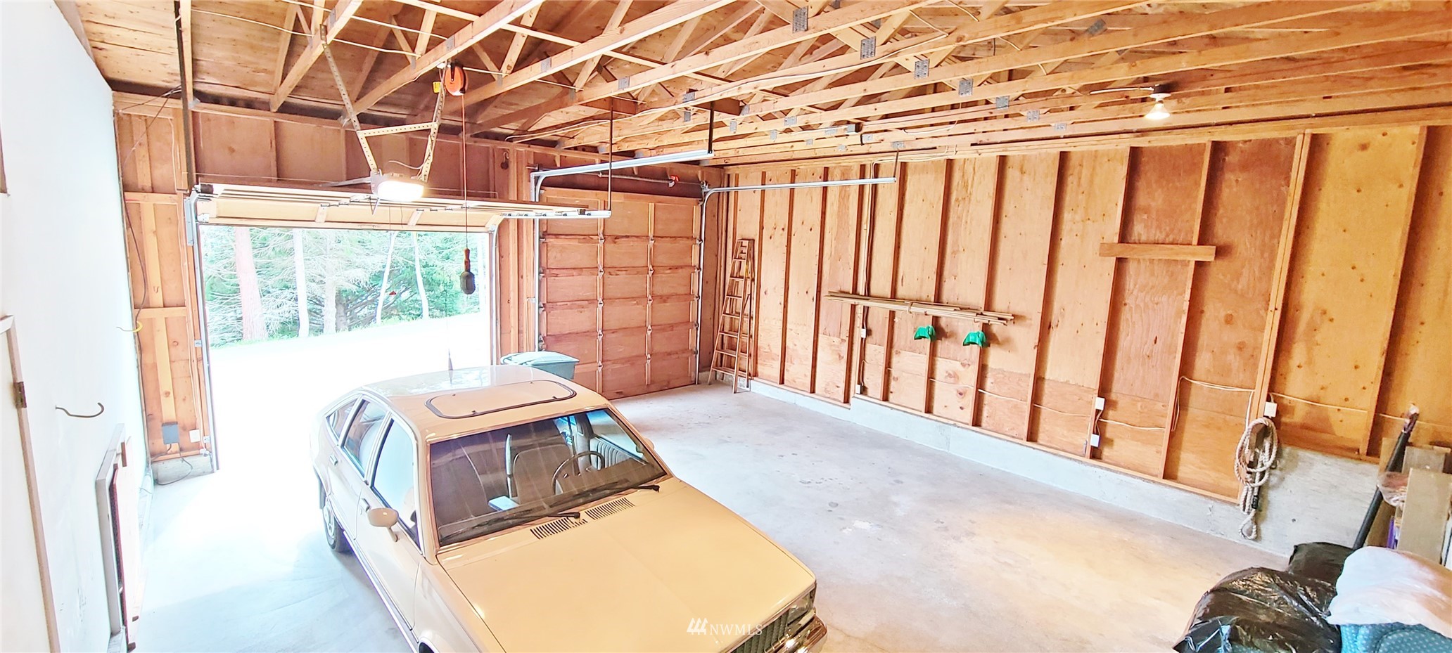 410 Discovery Way Sequim, WA 98382 - Photo 23 of 34 a view of a bedroom with windows