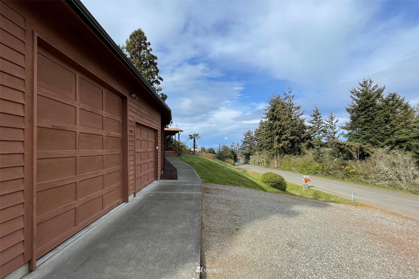 410 Discovery Way Sequim, WA 98382 - Photo 24 of 34 a view of a pathway of a house with a street