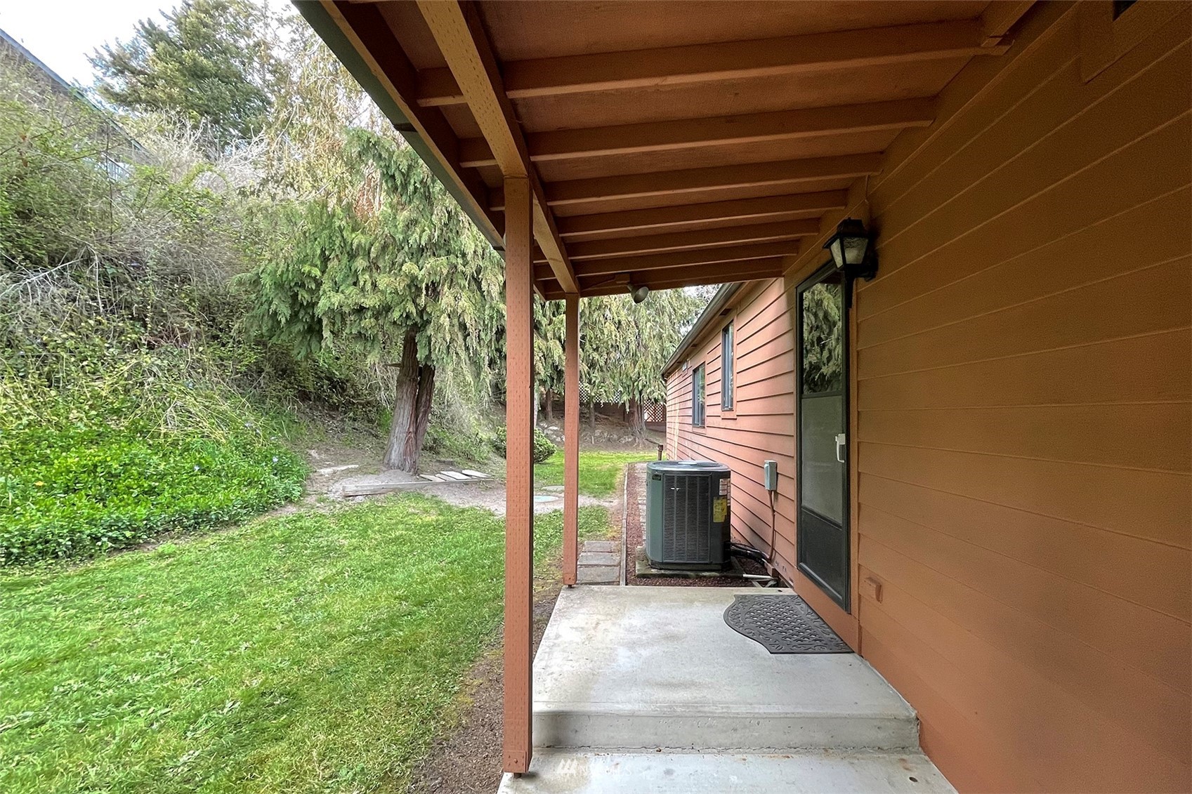 410 Discovery Way Sequim, WA 98382 - Photo 26 of 34 a view of house with backyard and garden