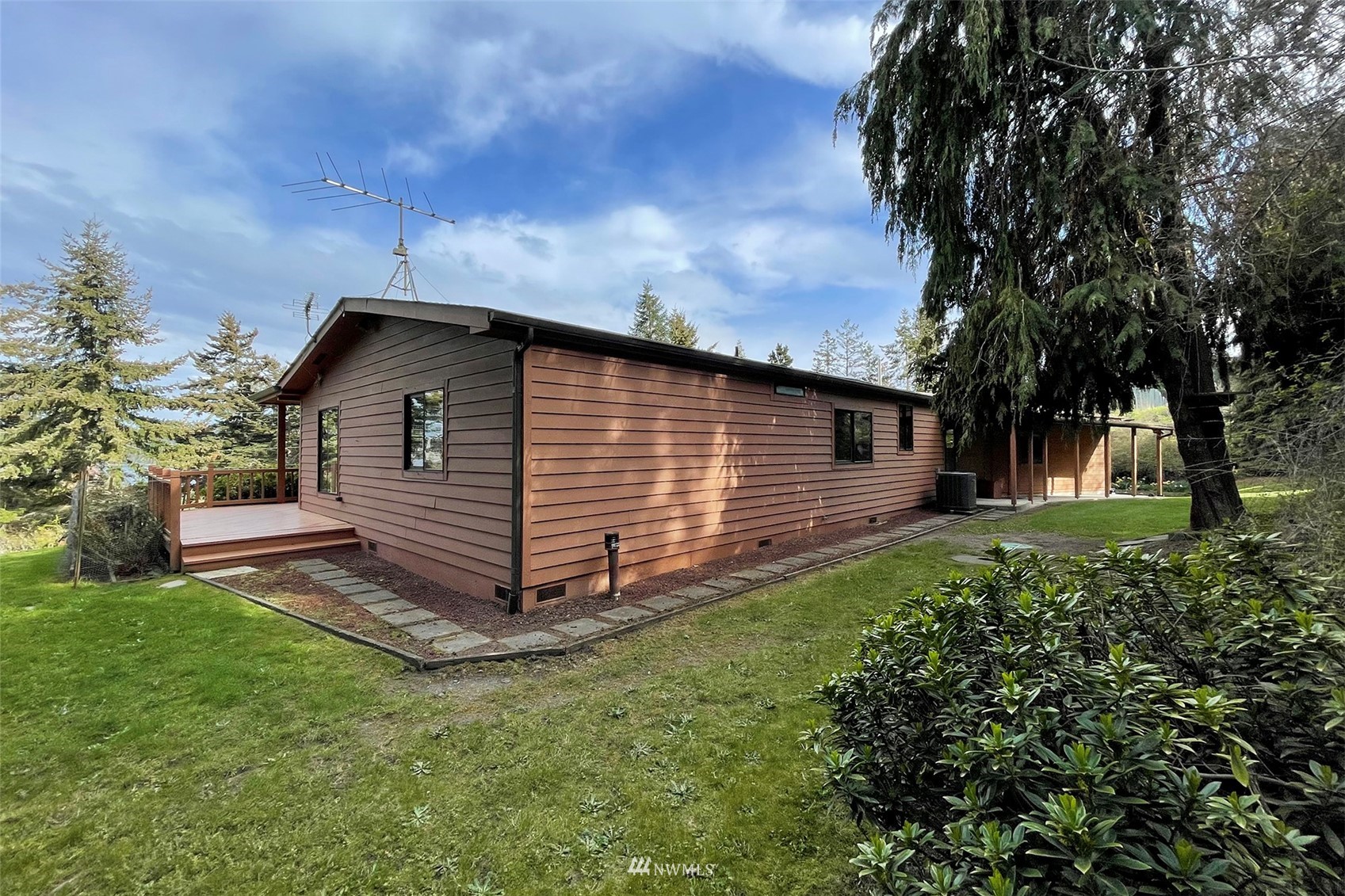 410 Discovery Way Sequim, WA 98382 - Photo 28 of 34 a view of a house with a yard
