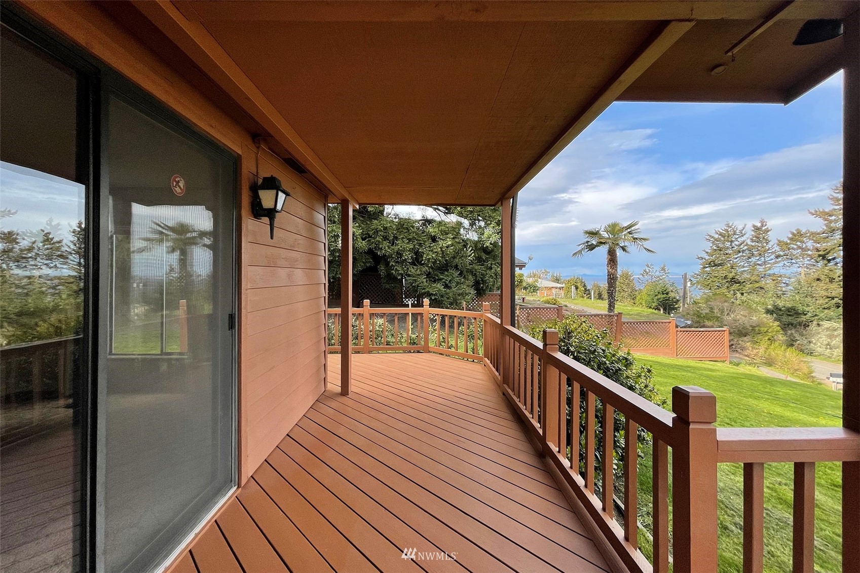 410 Discovery Way Sequim, WA 98382 - Photo 8 of 34 a view of balcony with wooden floor