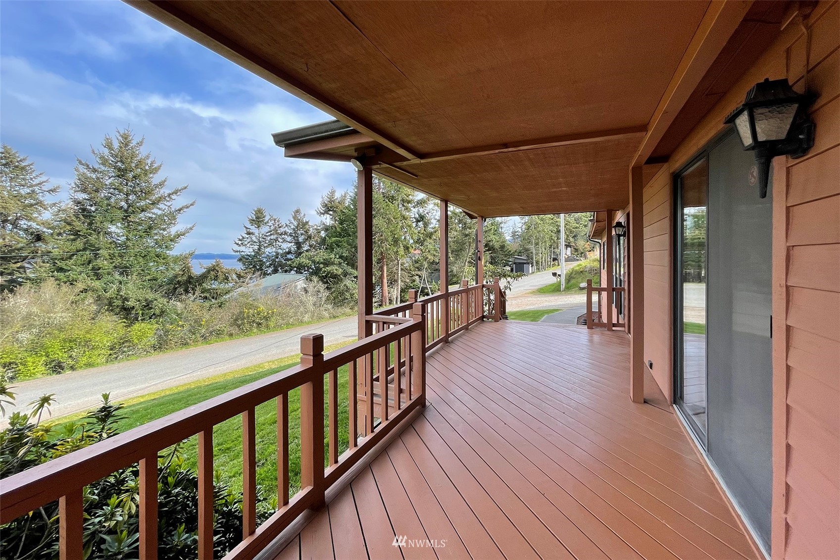 410 Discovery Way Sequim, WA 98382 - Photo 9 of 34 a view of a balcony with wooden floor