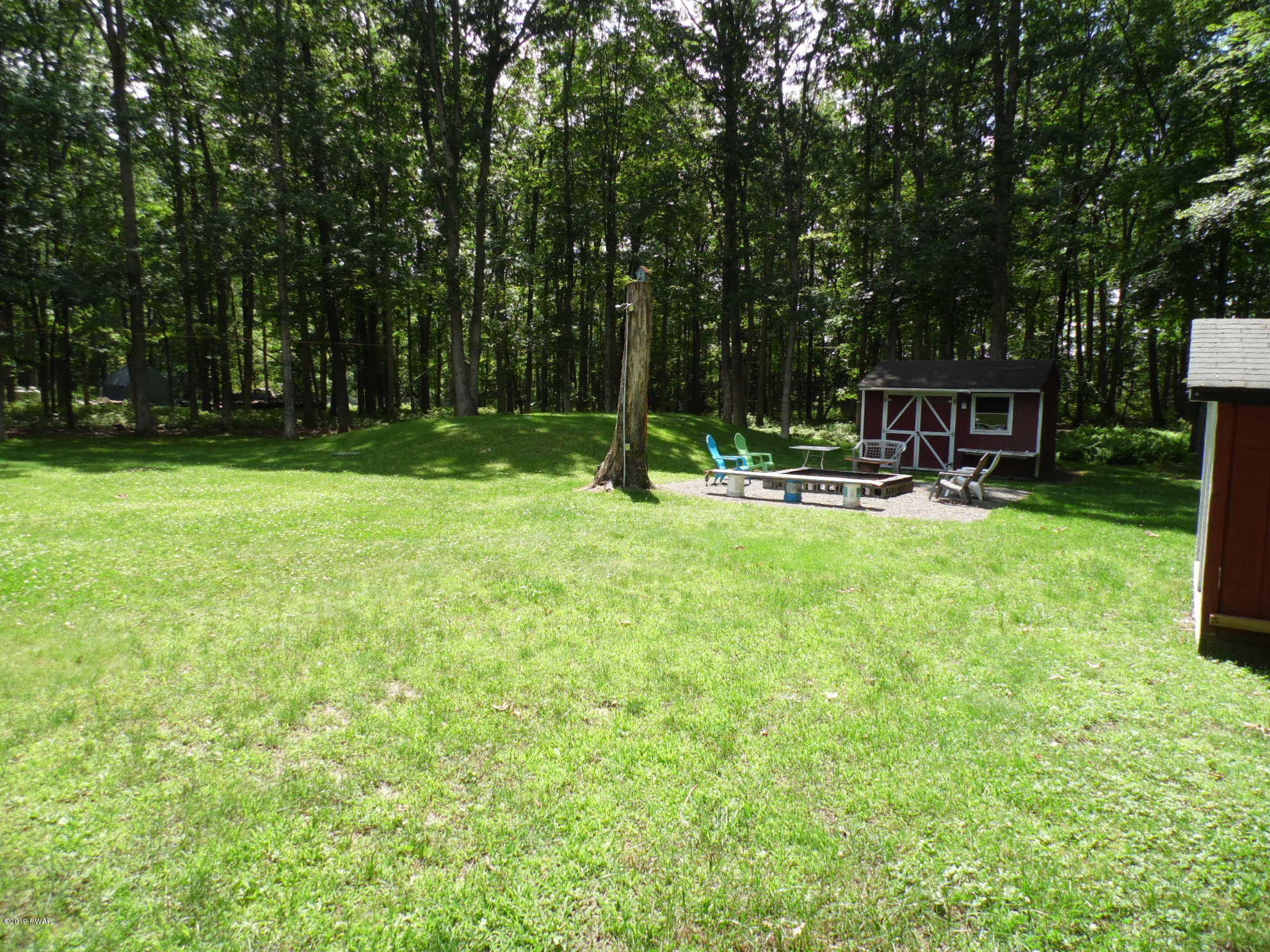 121 Weasel Road Dingmans Ferry, PA 18328 - Photo 40 of 40 Backyard view 2