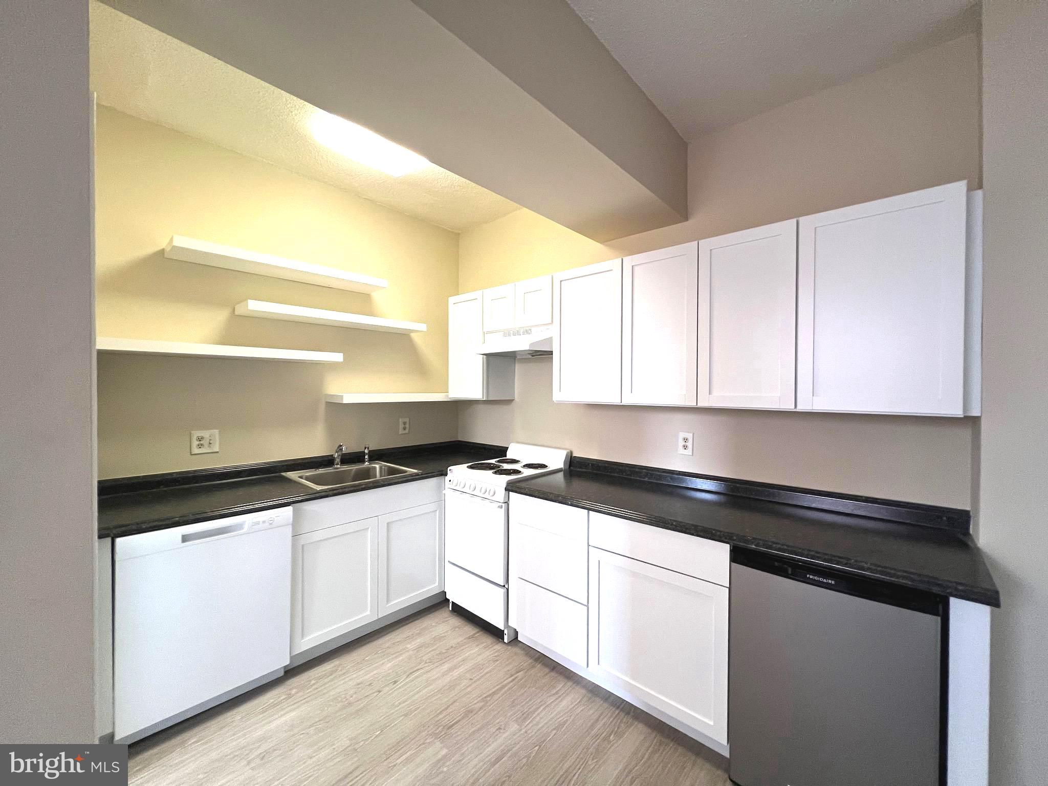 1001 St Paul Street, Unit 8J Baltimore, MD 21202 - Photo 1 of 10 Updated Kitchen w/ new cabinets