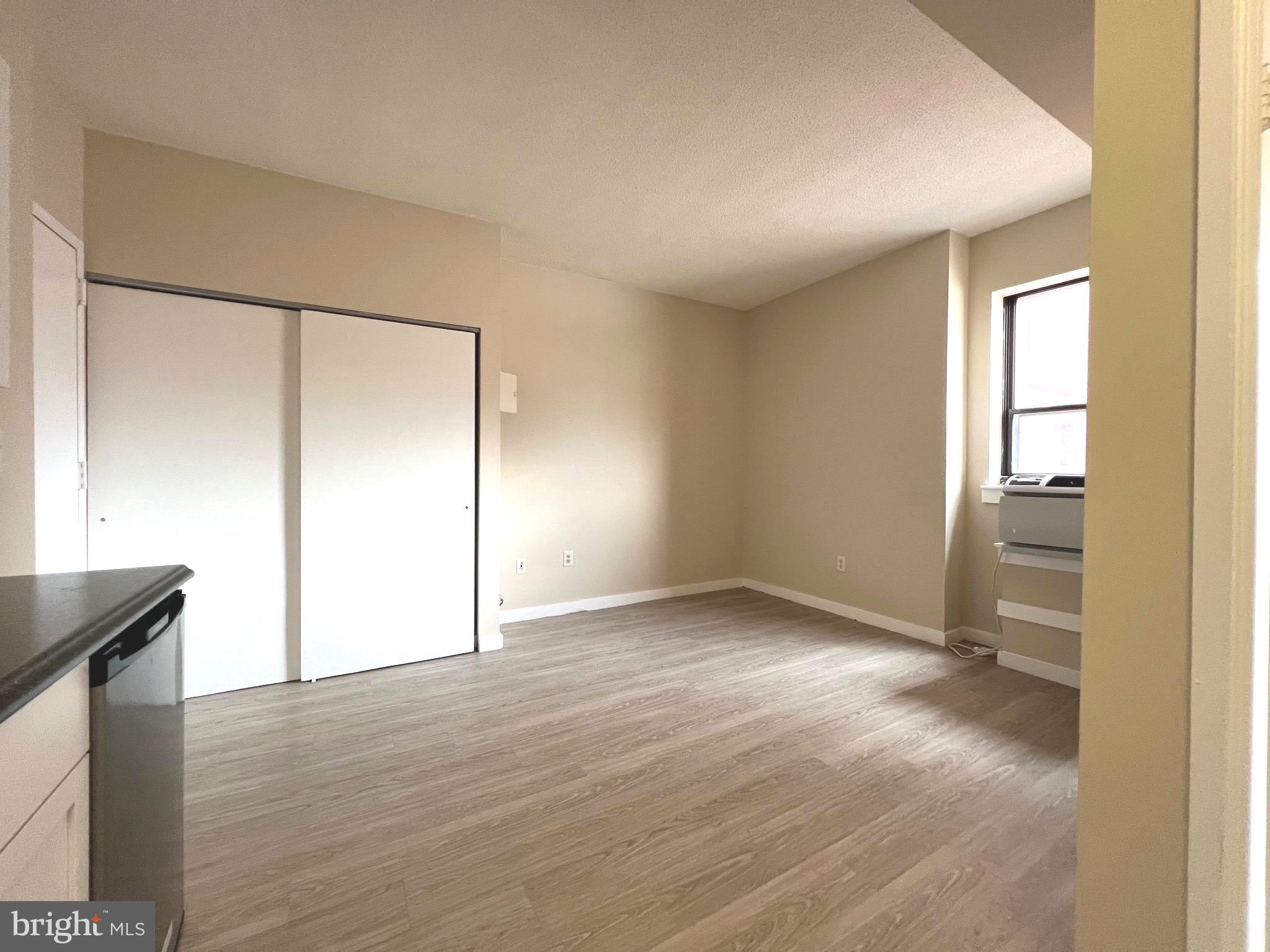 1001 St Paul Street, Unit 8J Baltimore, MD 21202 - Photo 3 of 10 Open Studio w/ new flooring