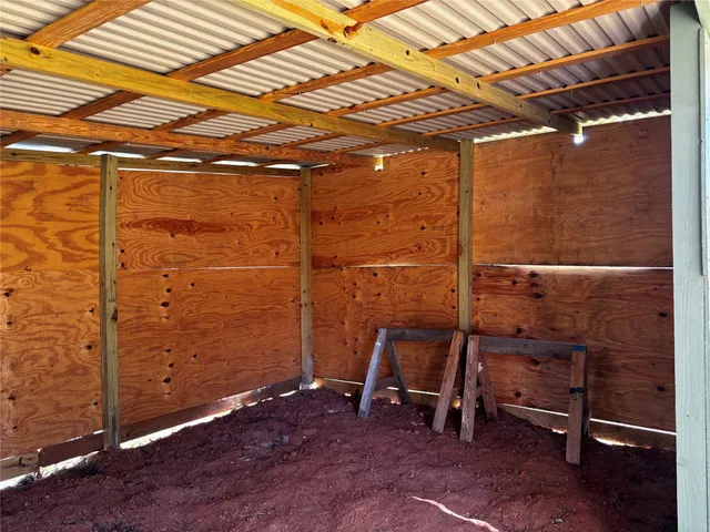 a bathroom with a shower and a sink