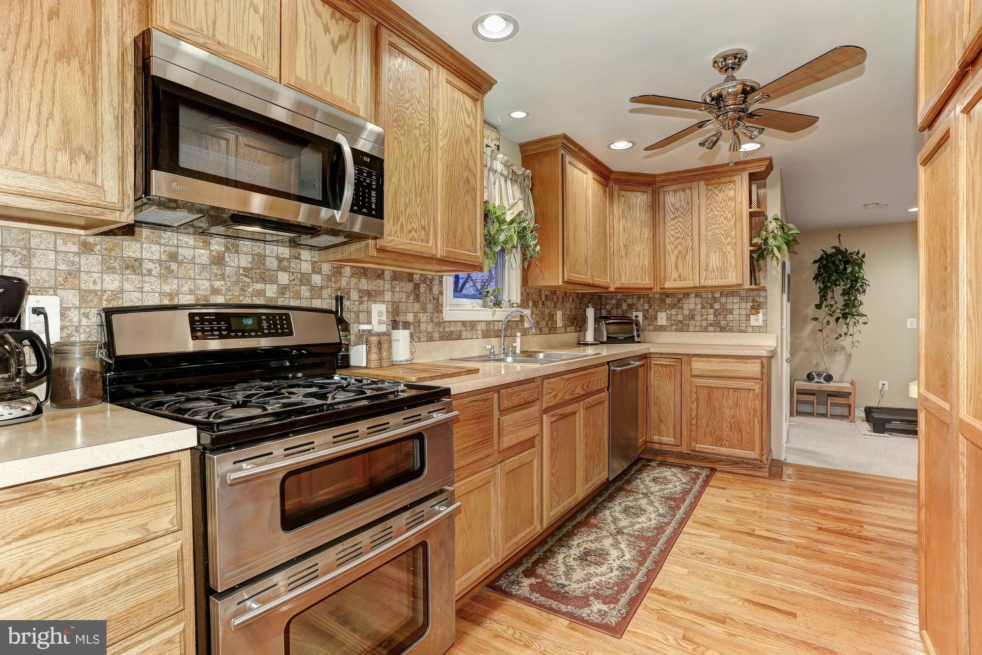 6412 Sherwood Road Baltimore, MD 21239 - Photo 12 of 30 Fab kitchen with tons of cabinets and storage