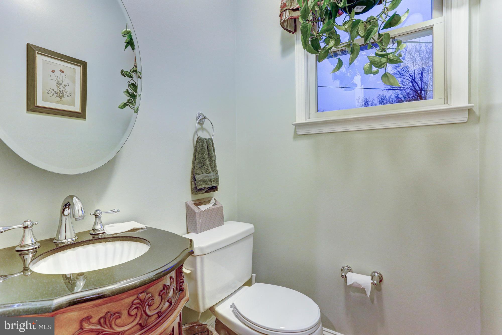 6412 Sherwood Road Baltimore, MD 21239 - Photo 19 of 30 Half bath powder room in family room