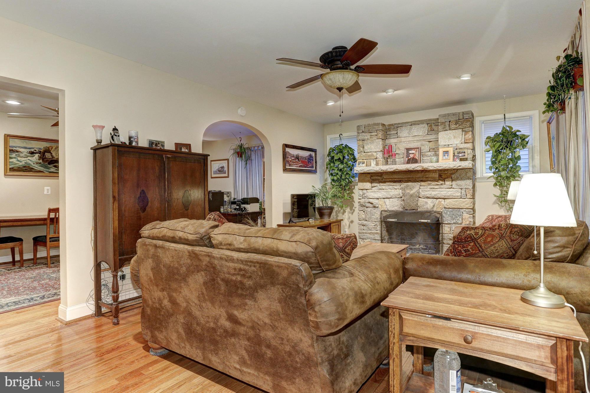 6412 Sherwood Road Baltimore, MD 21239 - Photo 8 of 30 Living Room with custom stone fp