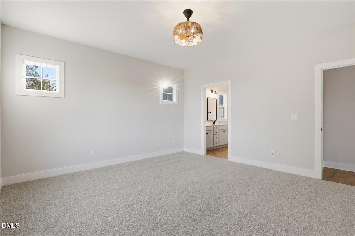 47 Gold Court Kenly, NC 27542 - Photo 18 of 32 a view of an empty room with a window