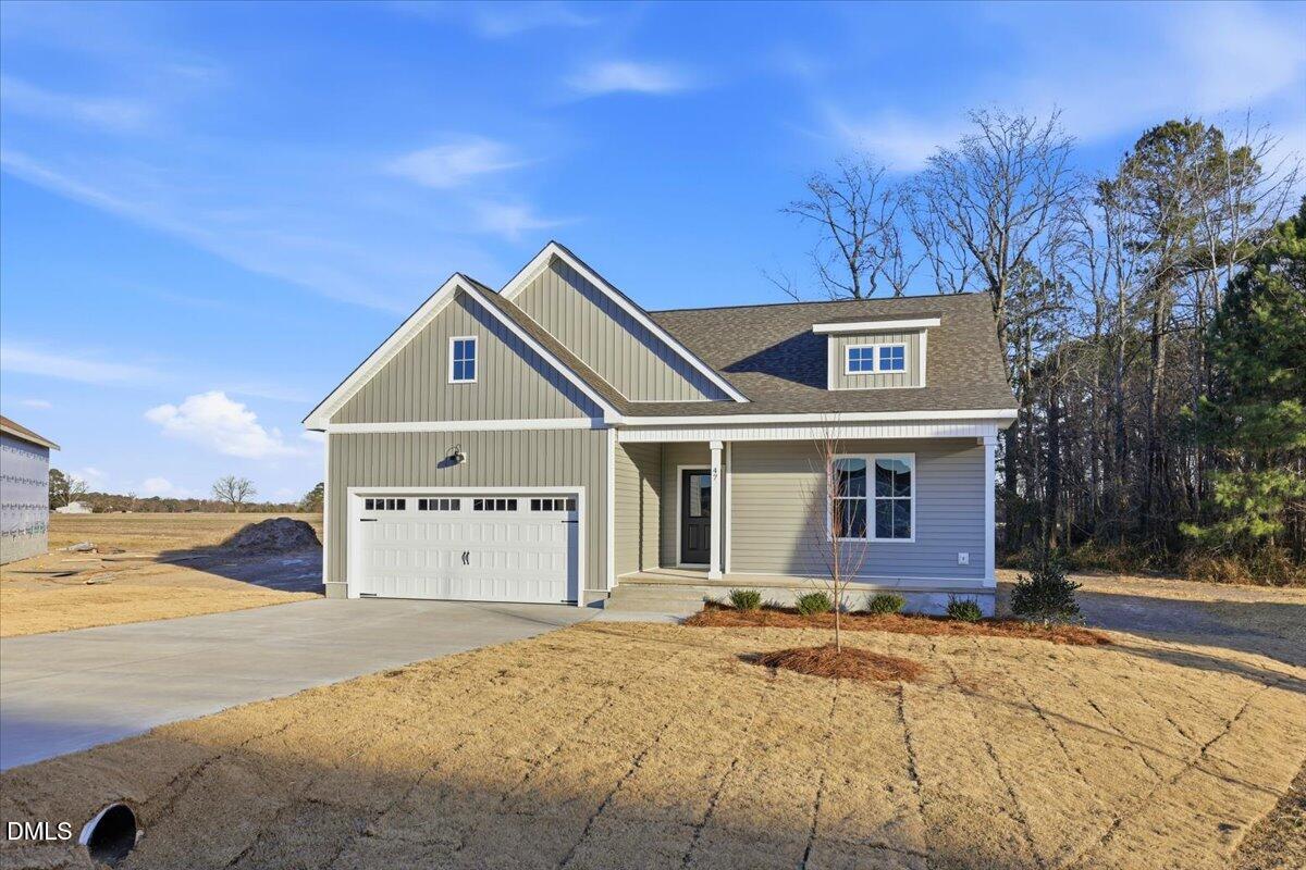 47 Gold Court Kenly, NC 27542 - Photo 2 of 32 a view of a house with a yard