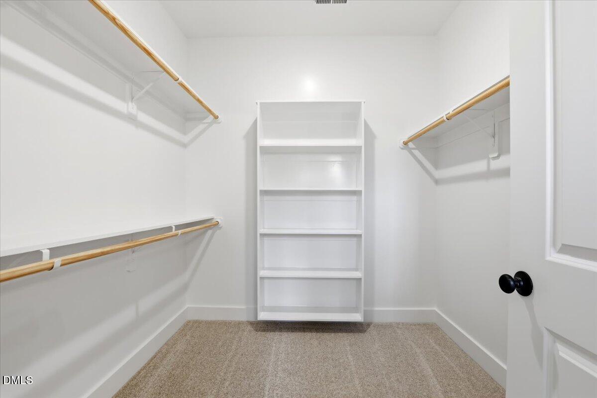 47 Gold Court Kenly, NC 27542 - Photo 22 of 32 a view of an empty walk in closet