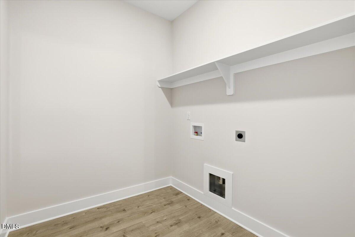 47 Gold Court Kenly, NC 27542 - Photo 28 of 32 a view of a livingroom with an empty space