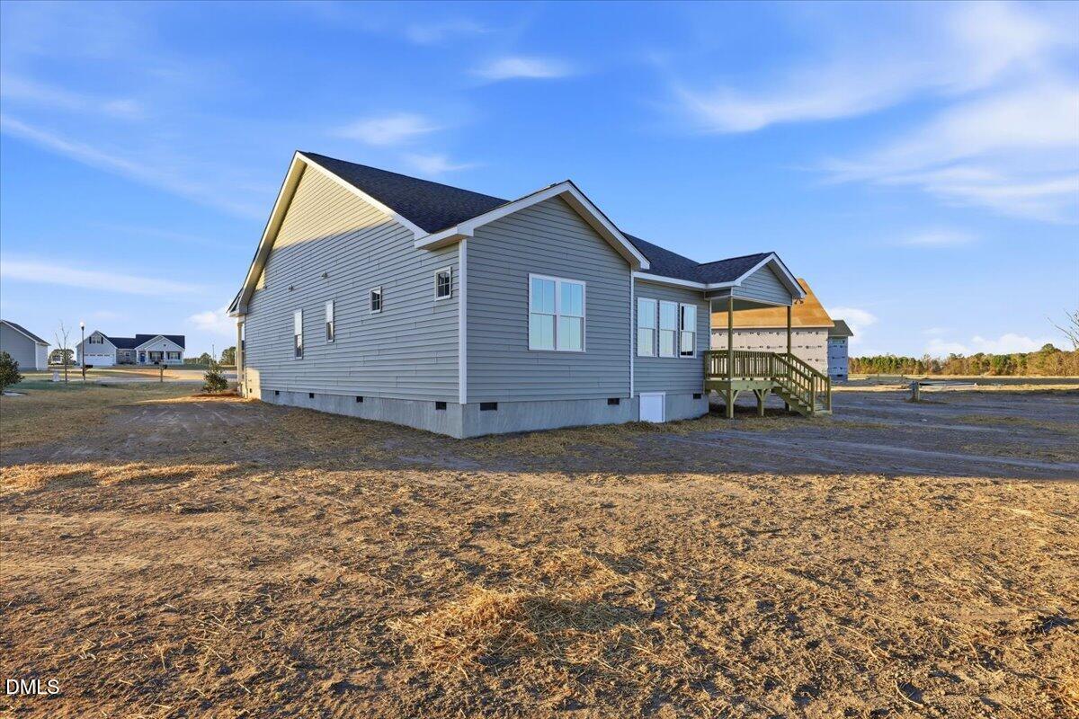 47 Gold Court Kenly, NC 27542 - Photo 32 of 32 a house view with a outdoor space
