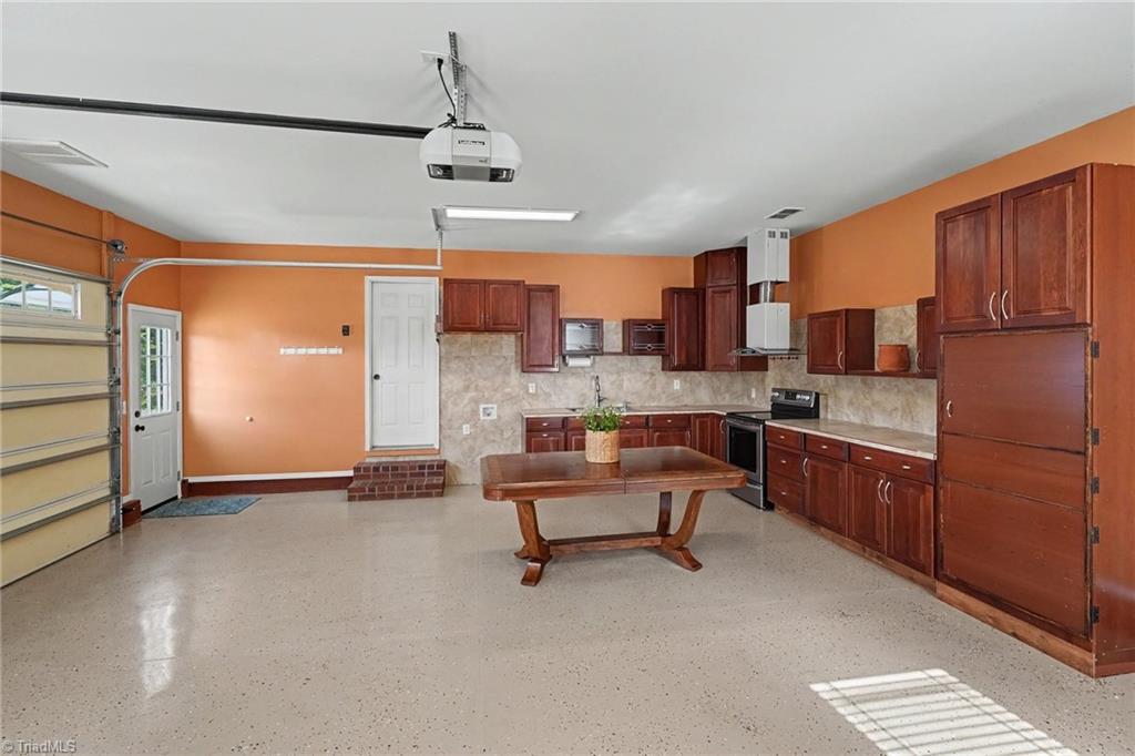 8430 Rumbley Road Summerfield, NC 27358 - Photo 11 of 44 Kitchen in the garage