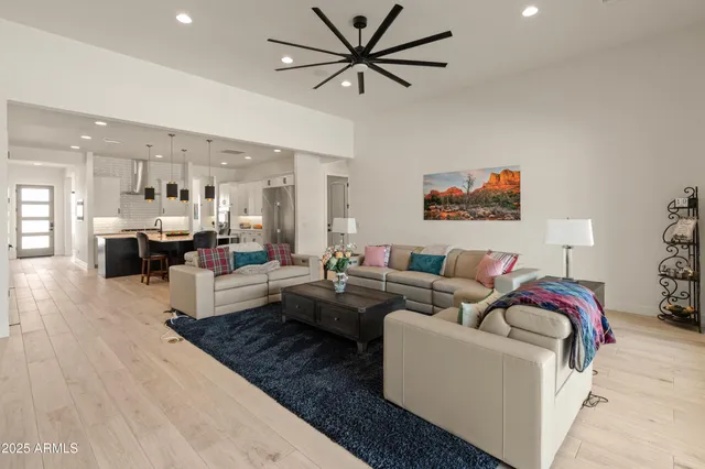 a view of a room with wooden floor