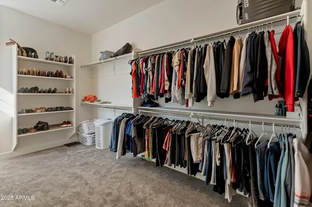 a view of an empty room with a balcony