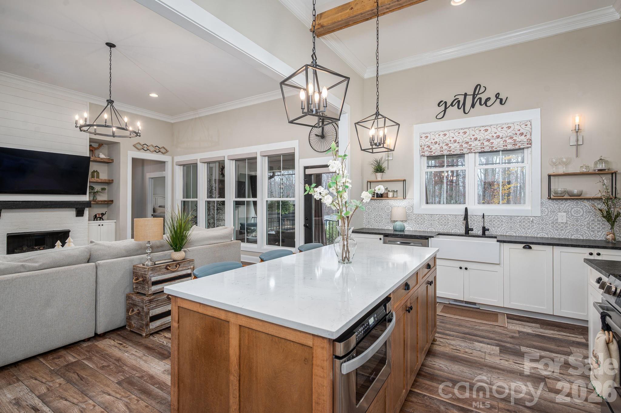 2656 Lee Lawing Road Lincolnton, NC 28092 - Photo 11 of 48 a kitchen with a center island and living room
