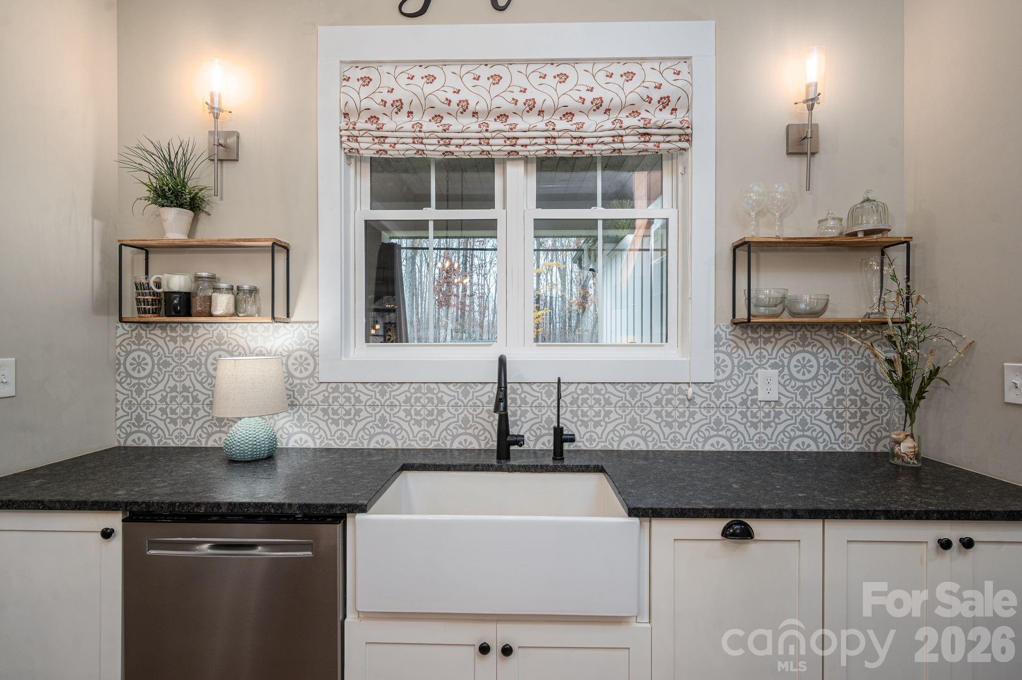 2656 Lee Lawing Road Lincolnton, NC 28092 - Photo 14 of 48 a kitchen with a sink and cabinets