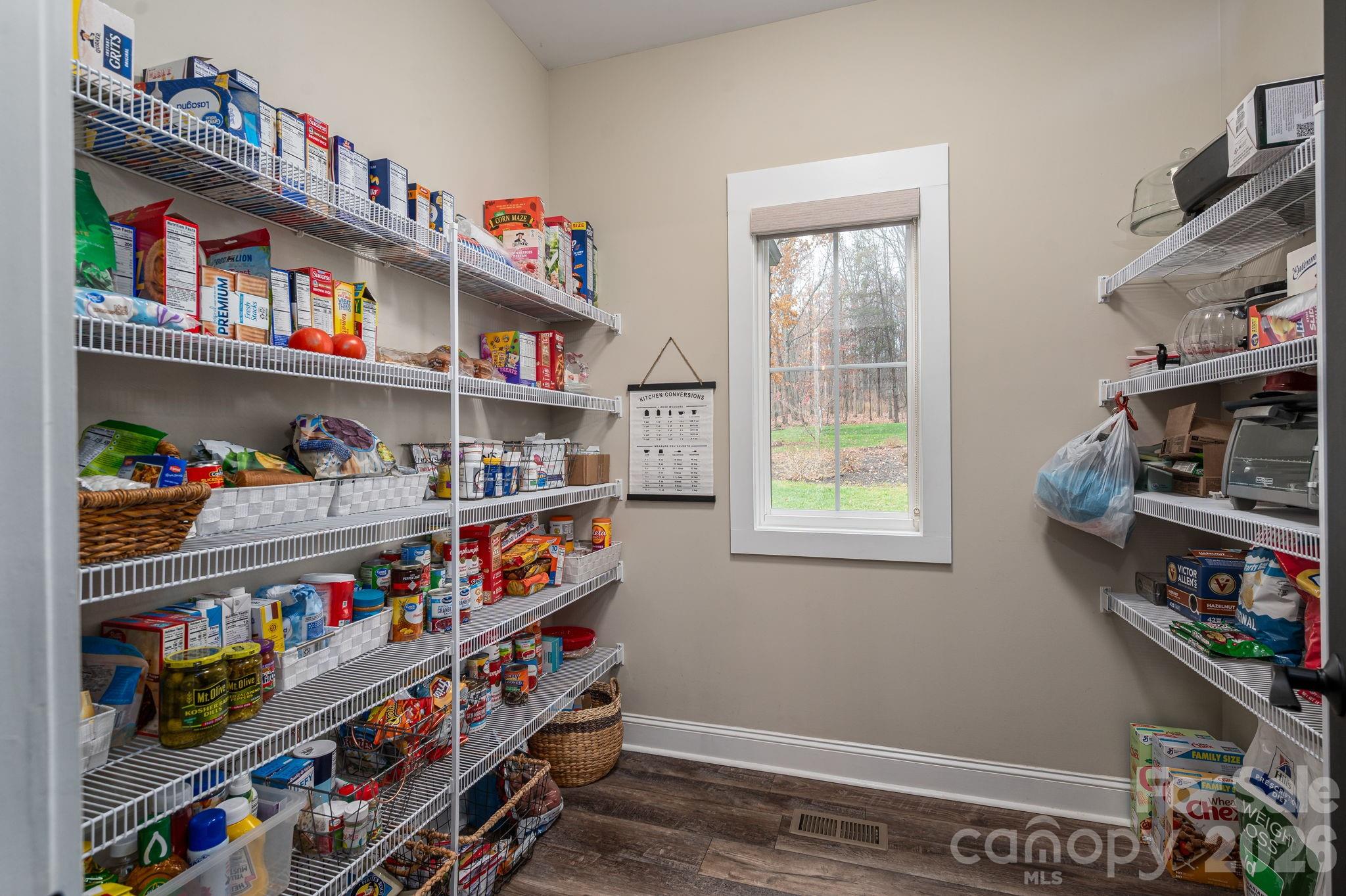 2656 Lee Lawing Road Lincolnton, NC 28092 - Photo 16 of 48 a room with furniture cabinets and a window