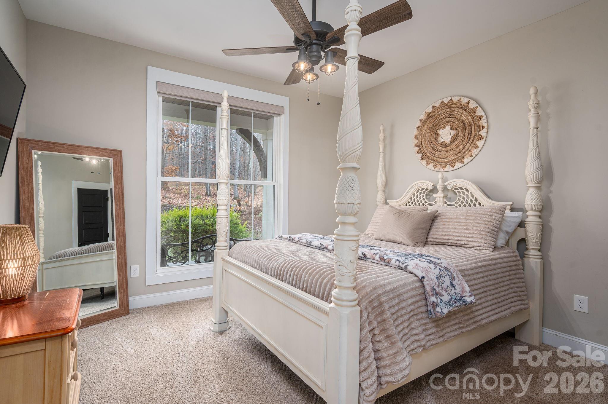 2656 Lee Lawing Road Lincolnton, NC 28092 - Photo 19 of 48 a bed sitting in a bedroom next to a window