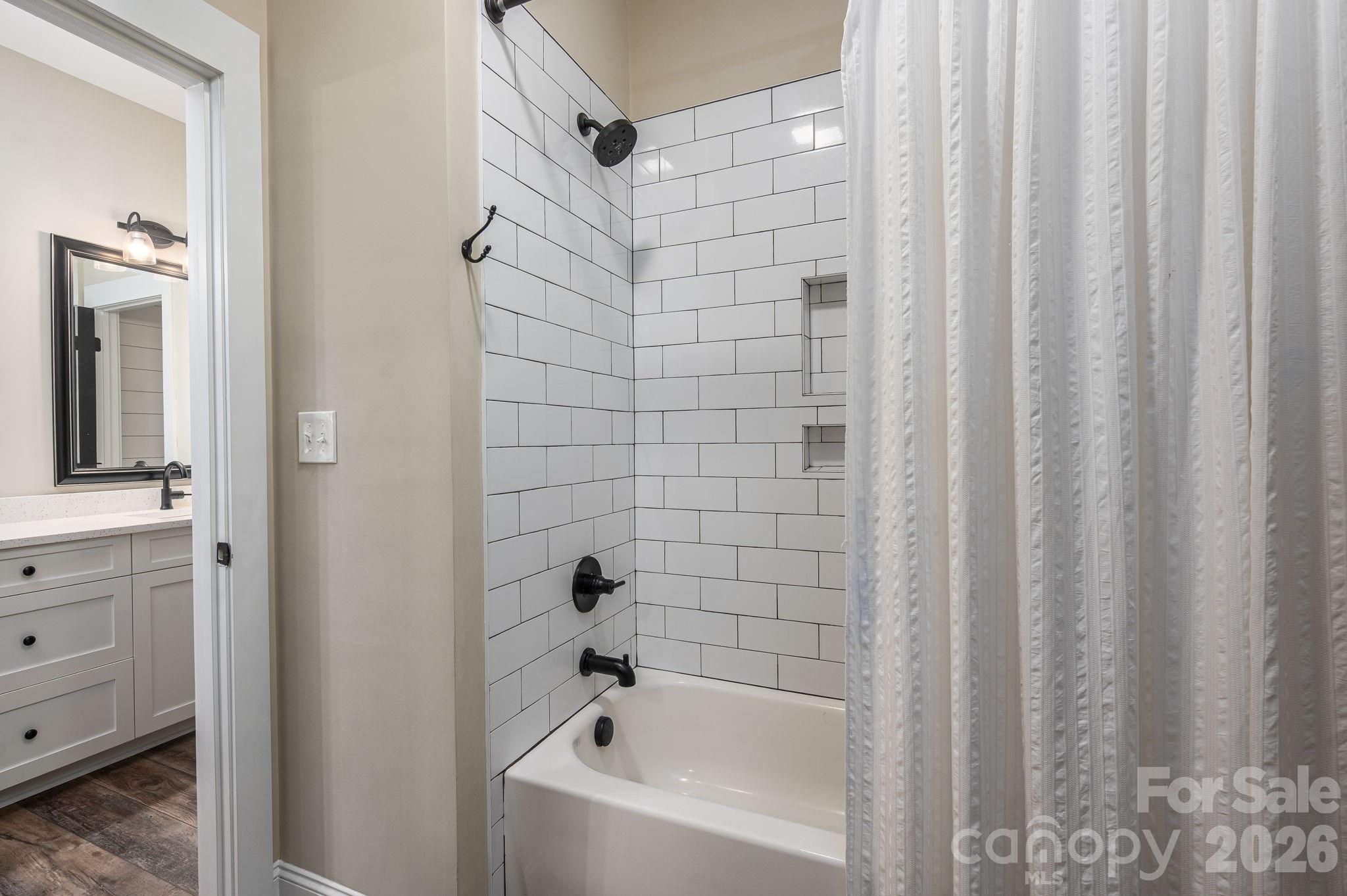 2656 Lee Lawing Road Lincolnton, NC 28092 - Photo 24 of 48 a bathroom with a bathtub and shower