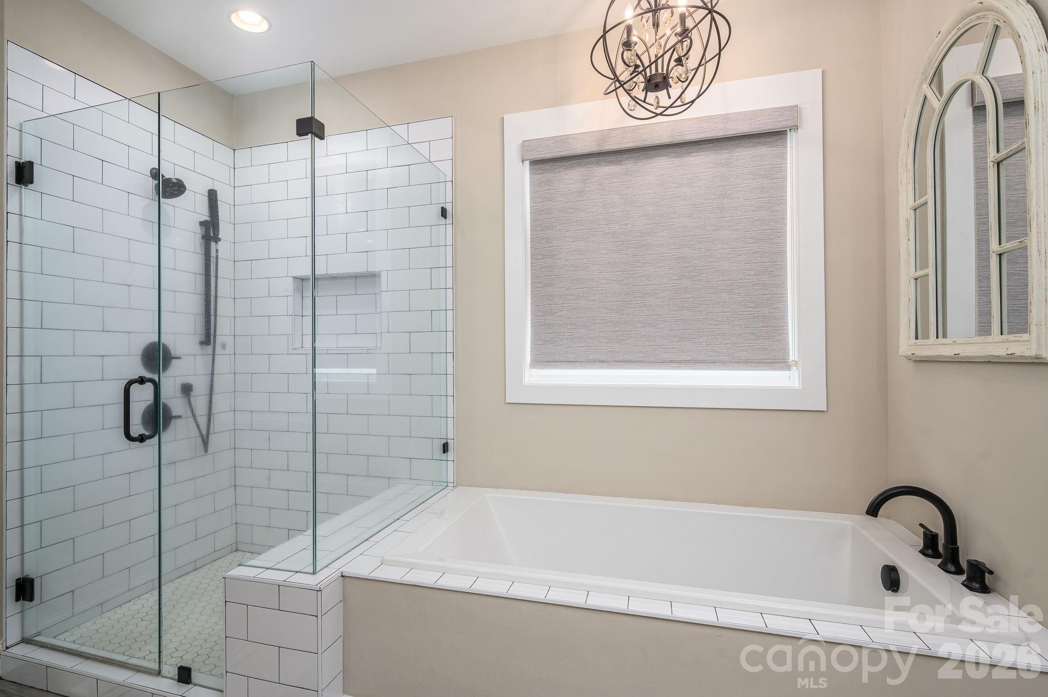 2656 Lee Lawing Road Lincolnton, NC 28092 - Photo 28 of 48 a bathroom with a bathtub and shower