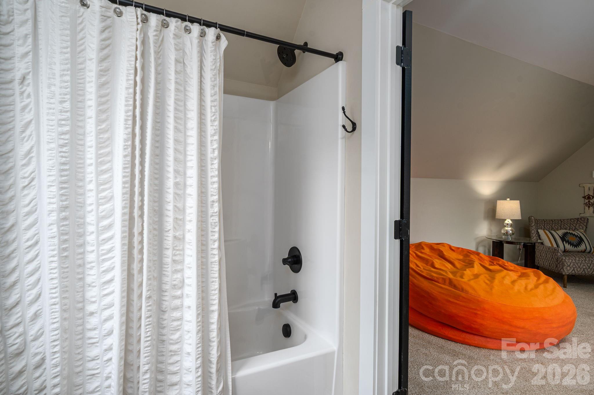 2656 Lee Lawing Road Lincolnton, NC 28092 - Photo 35 of 48 a bathroom with a tub and shower