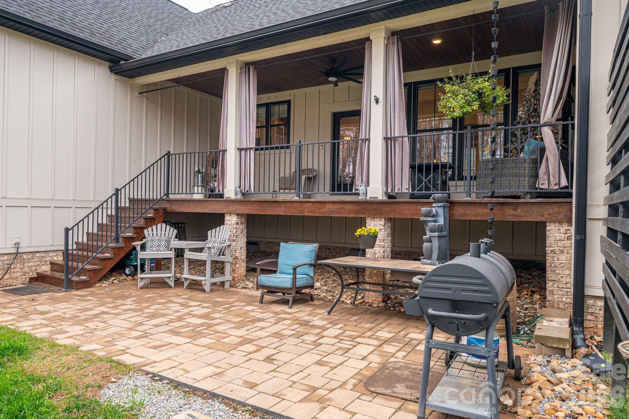 2656 Lee Lawing Road Lincolnton, NC 28092 - Photo 38 of 48 a view of a chairs and a table in the patio