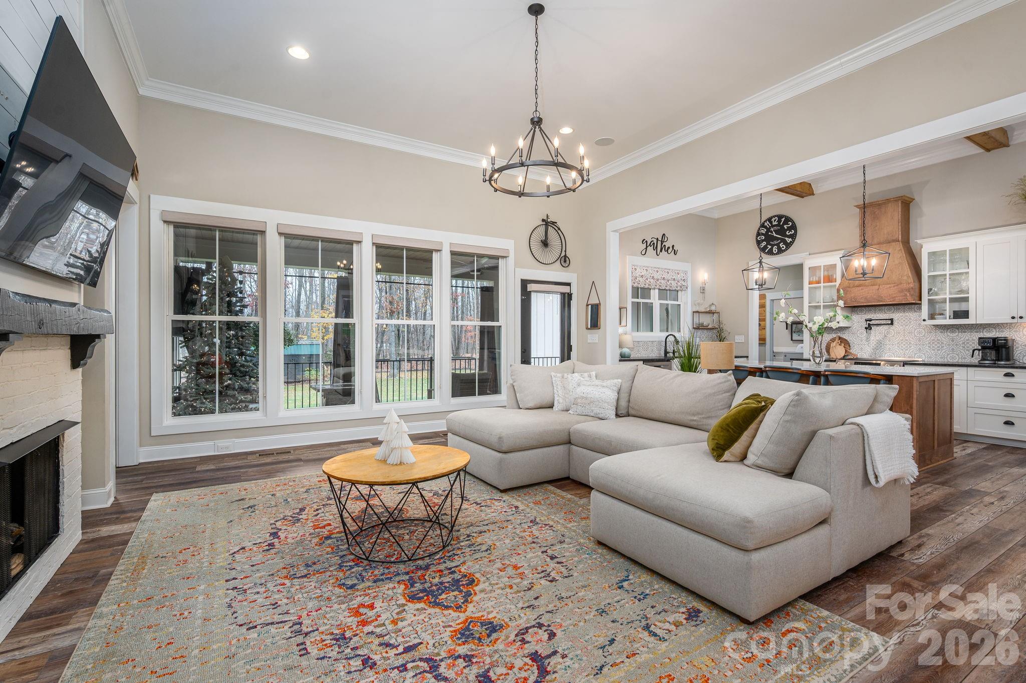 2656 Lee Lawing Road Lincolnton, NC 28092 - Photo 6 of 48 a living room with fireplace furniture and a large window
