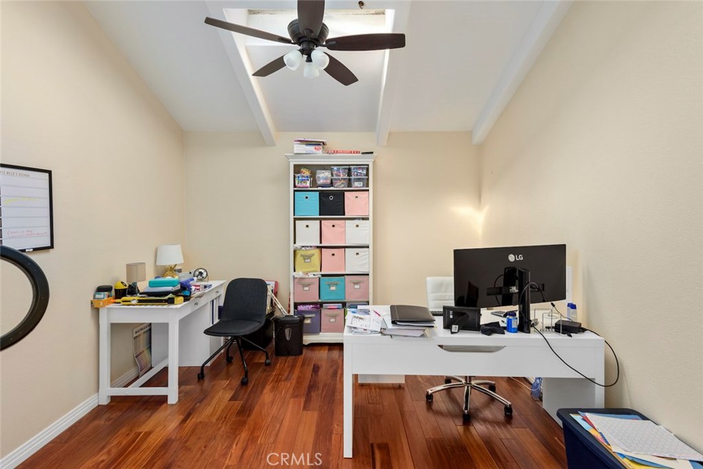 25 Birdsong Irvine, CA 92604 - Photo 11 of 29 a view of a workspace with furniture and wooden floor