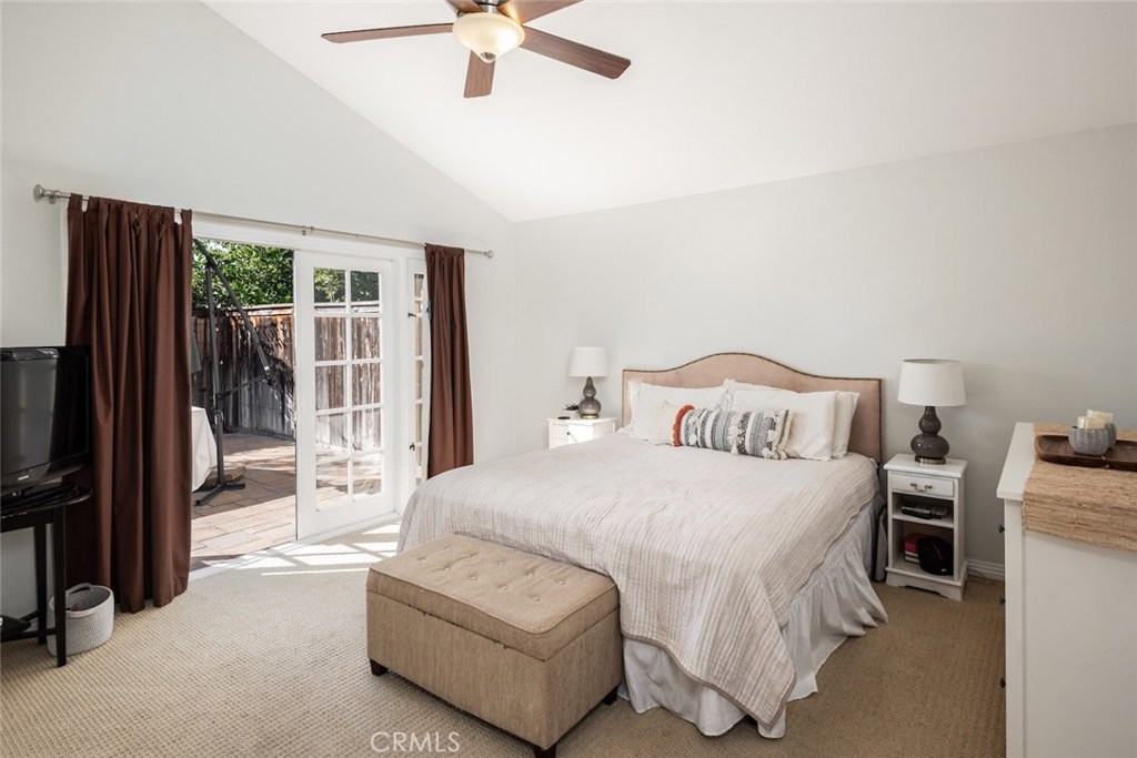 25 Birdsong Irvine, CA 92604 - Photo 16 of 29 a bedroom with a bed and a flat tv screen