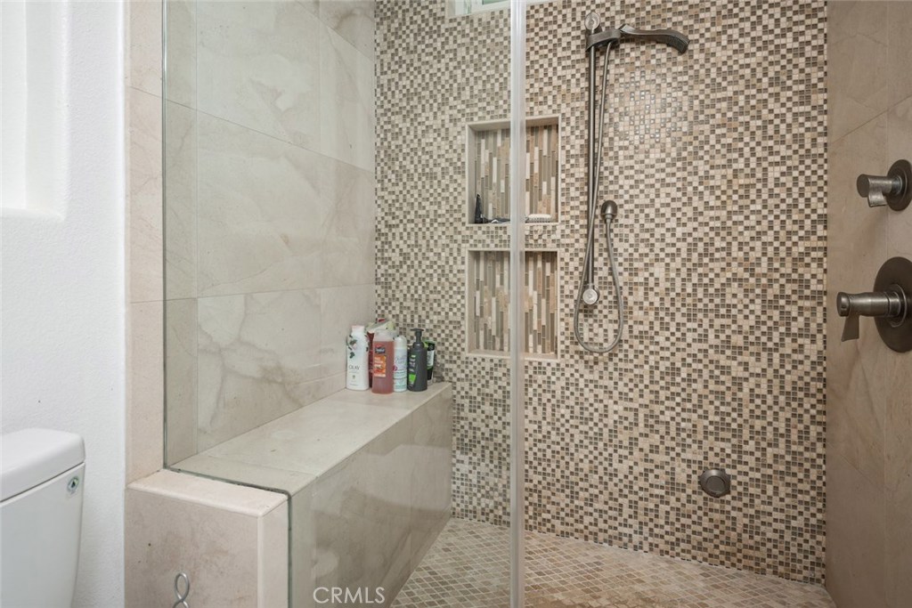 25 Birdsong Irvine, CA 92604 - Photo 18 of 29 a bathroom with a shower