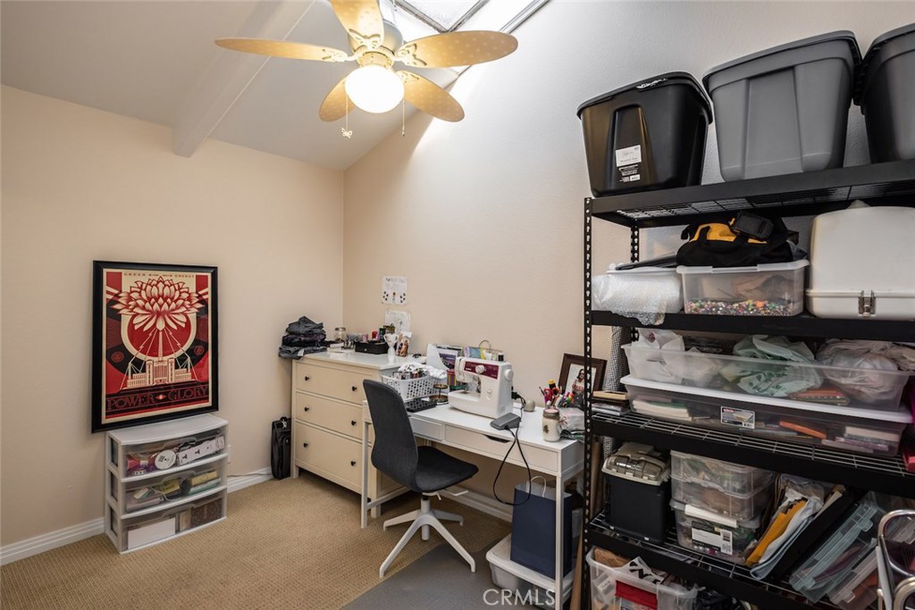 25 Birdsong Irvine, CA 92604 - Photo 19 of 29 a room with furniture a flat screen tv and a window