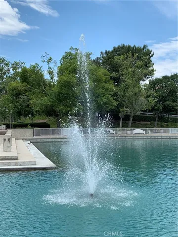 a view of swimming pool with a yard