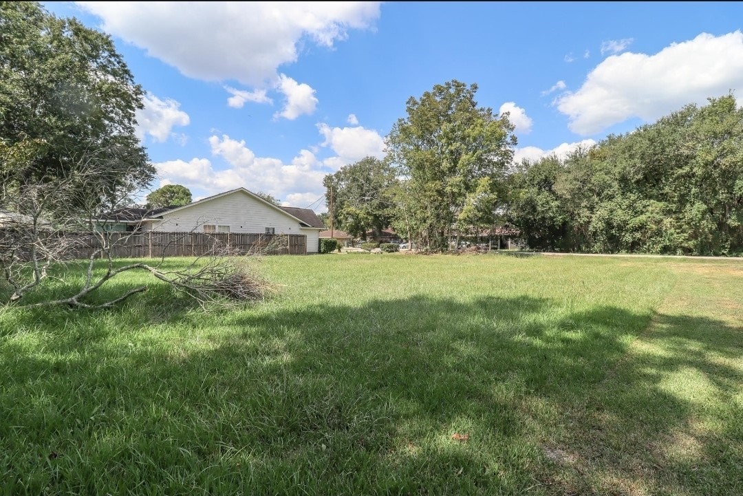 0 Josey Street Beaumont, TX 77707 - Photo 7 of 9 a view of green field with grass and trees