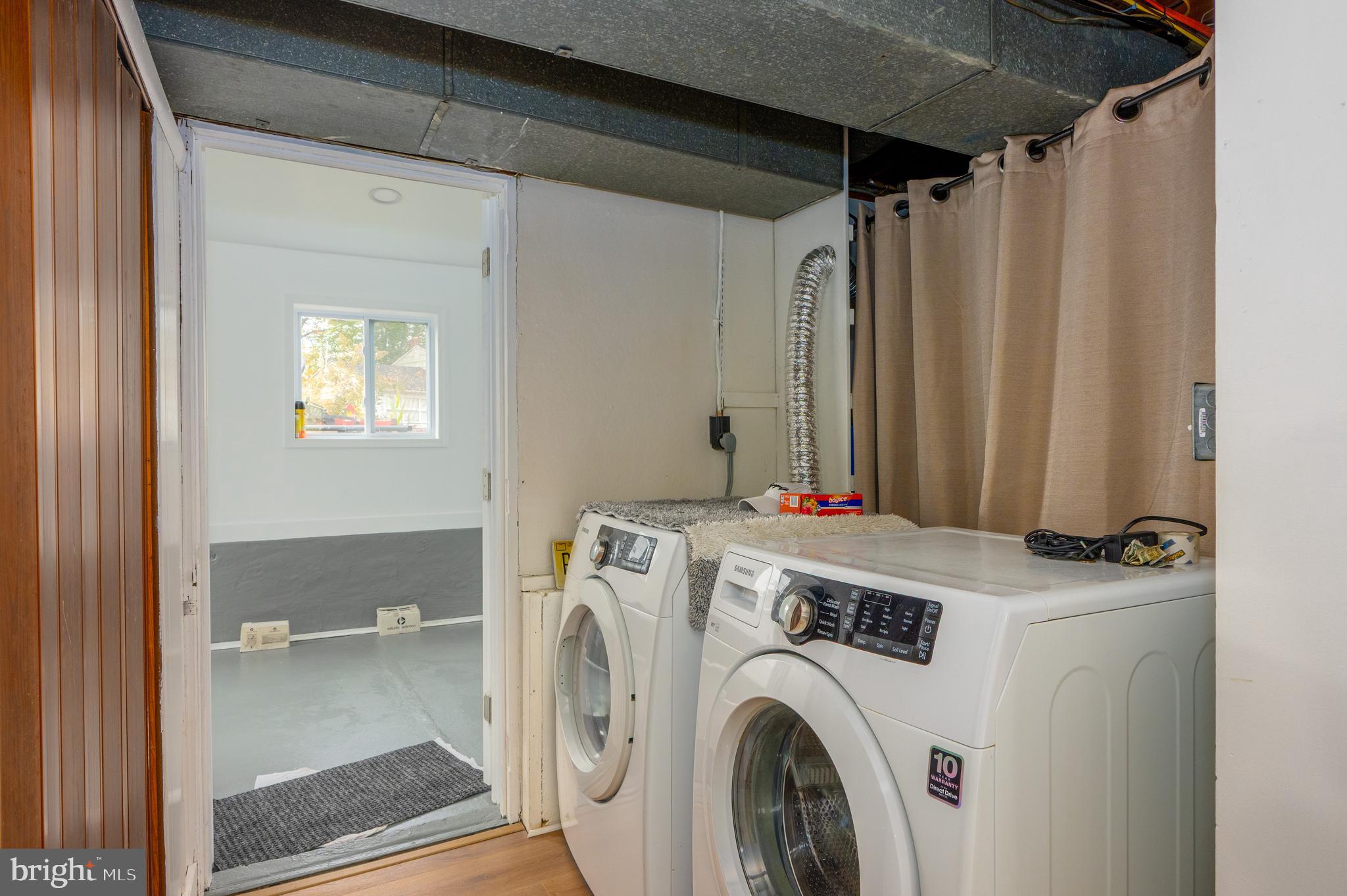 458 Roberts Way Aberdeen, MD 21001 - Photo 16 of 22 a view of storage and utility room with washer and dryer