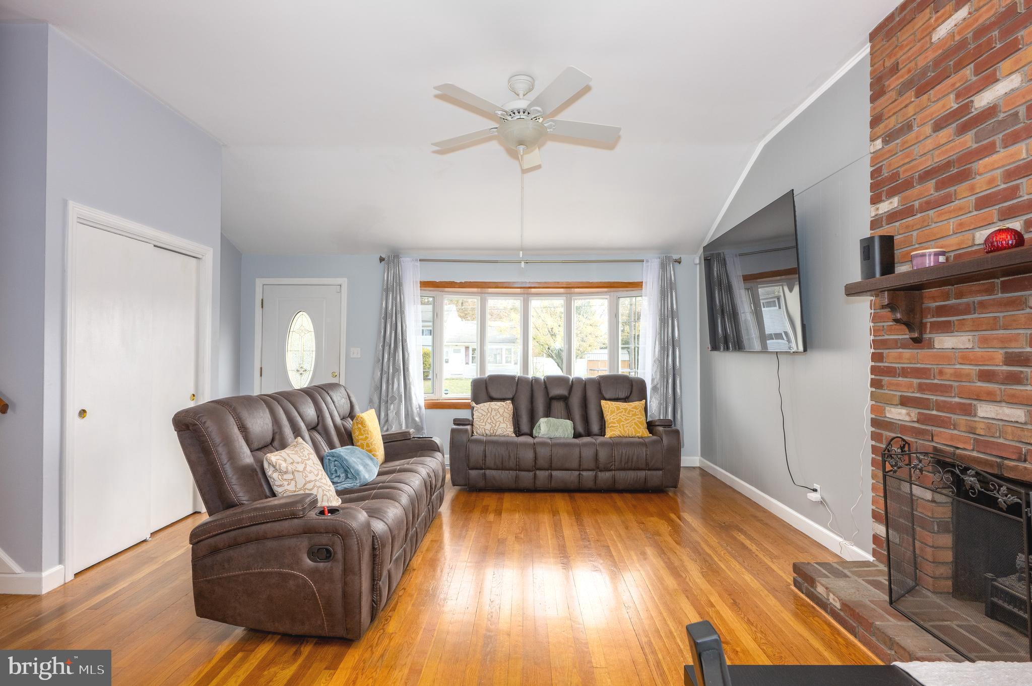 458 Roberts Way Aberdeen, MD 21001 - Photo 5 of 22 a living room with furniture and a fireplace